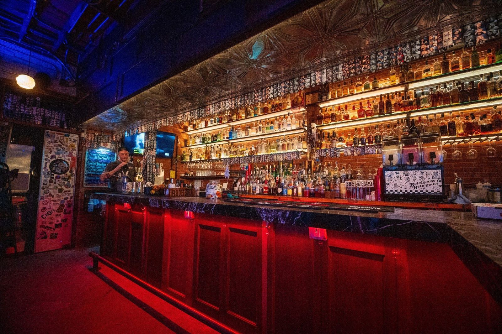 The bar at Betelgeuse Betelgeuse on Washington Ave, lit red underneath